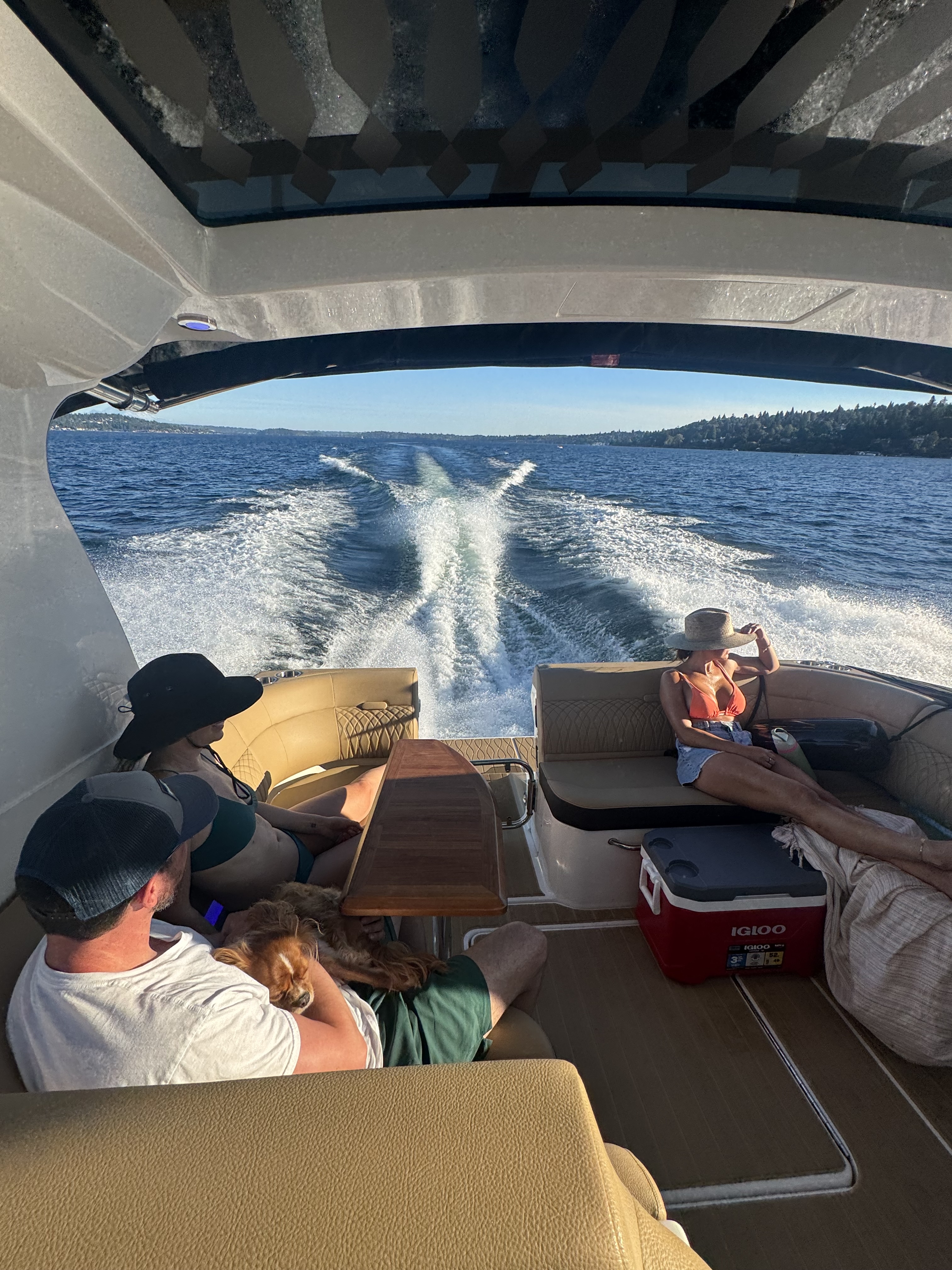 Cruising on Lake Washington with wake behind the boat